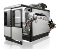 Роботы обслуживают станки